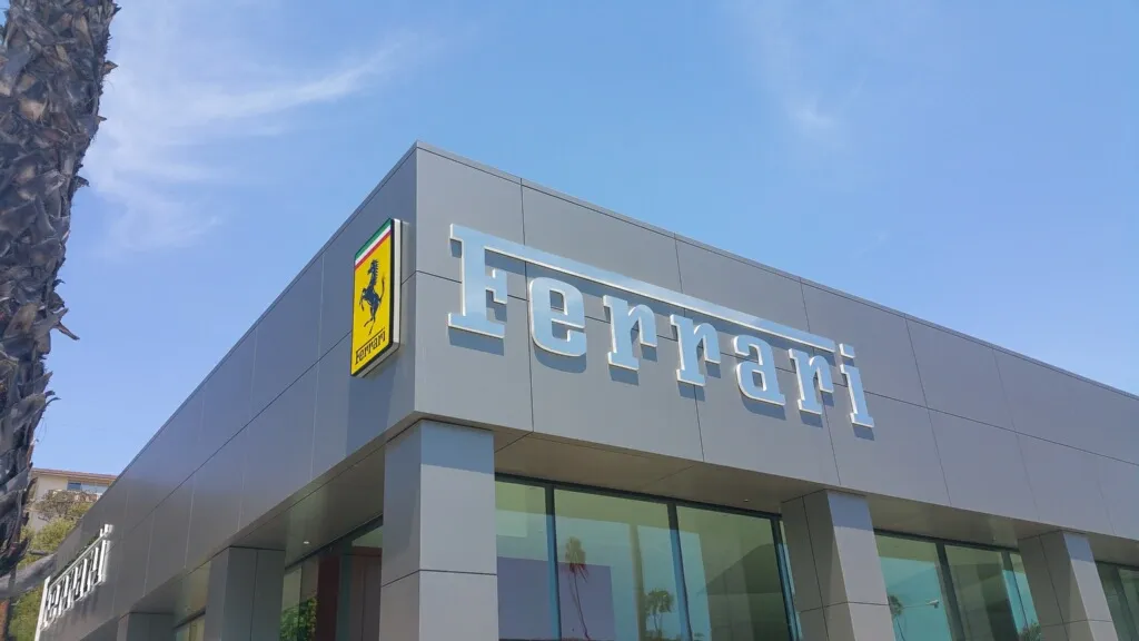 Ferrari channel letters installed on a modern commercial facade